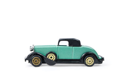 Close-up of toy car against white background