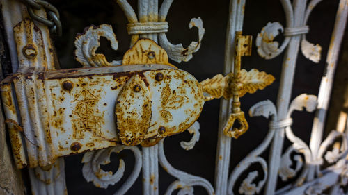 Close-up of old rusty metal fence