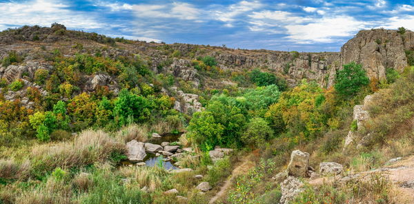 Deep granite canyon with the mertvovod river in aktovo village, nikolaev region, ukraine