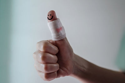 Close-up of person holding hands