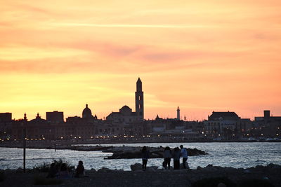 Silhouette of buildings at sunset