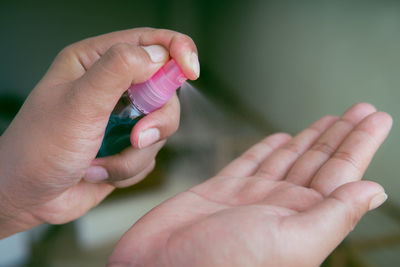 Close-up of hand holding hands