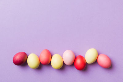 High angle view of easter eggs against blue background