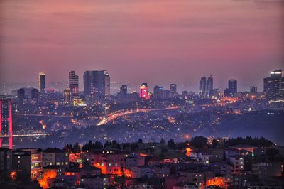 High angle view of illuminated city at night