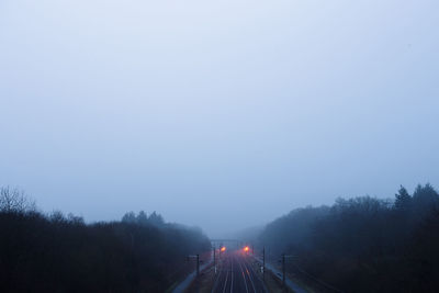 High angle view of illuminated trees against clear sky