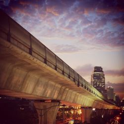 View of bridge against cloudy sky