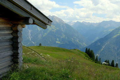 Cabin on a meadow in the mountains in lech, lechtal, austria