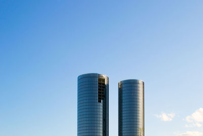 Low angle view of modern buildings against sky