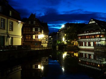 Buildings in city at night