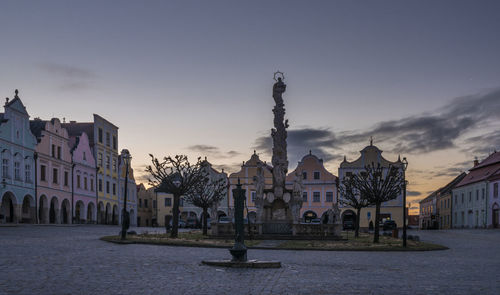 Buildings in city against sky