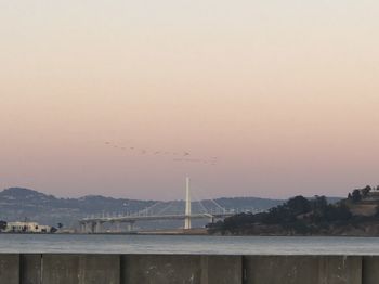 Bridge over river against sky