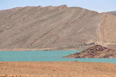 Scenic view of desert against mountain