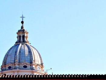 Low angle view of church against blue sky