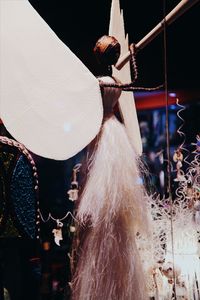 Rear view of senior woman wearing hat