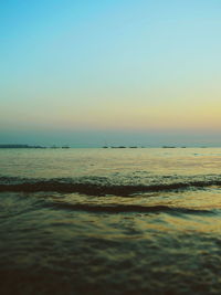 Scenic view of sea at sunset