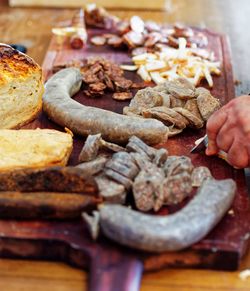 Close-up of hand holding meat