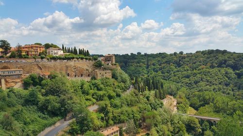 Panoramic view of agricultural landscape against sky