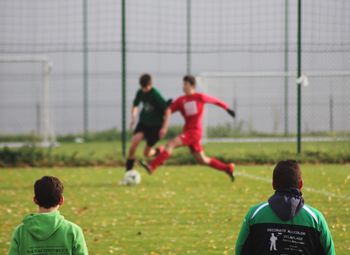 People on soccer field