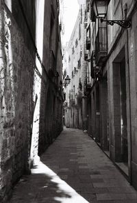 Walkway amidst buildings