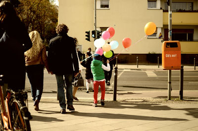 Full length of woman standing in city