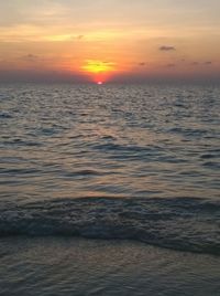 Scenic view of sea at sunset