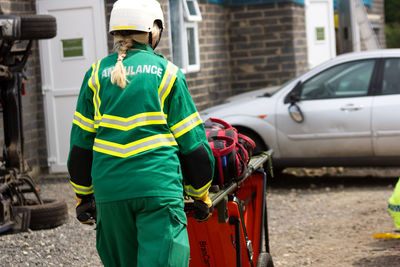 Rear view of man working