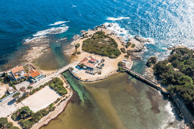 High angle view of sea amidst buildings