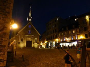 Illuminated street light at night