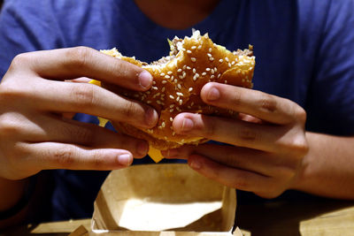 Close-up of man eating food