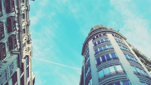 Low angle view of building against blue sky