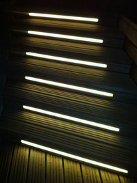 Close-up of illuminated lamp at night