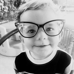 Portrait of boy wearing glasses