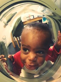 Close-up portrait of smiling boy