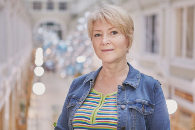 Portrait of smiling woman standing outdoors