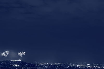 Illuminated cityscape at night