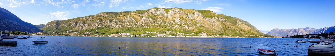 Panoramic view of bay against sky