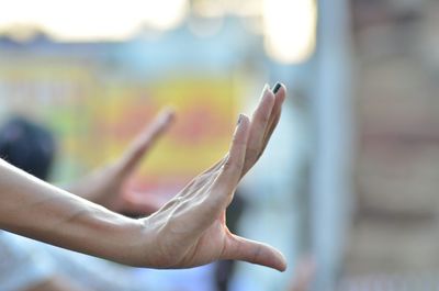 Close-up of woman hand using mobile phone