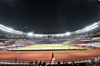 High angle view of illuminated people at night