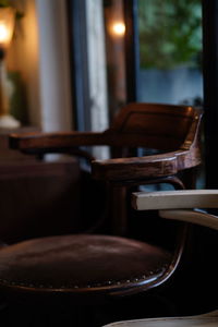 Close-up of empty chairs on table