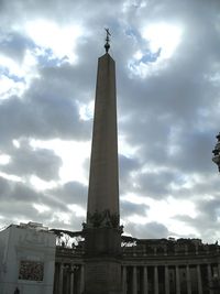 Low angle view of statue against cloudy sky