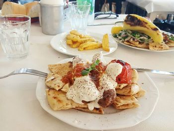 Close-up of breakfast served on table