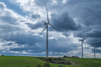 Windmills in landscape at låsby, denmark