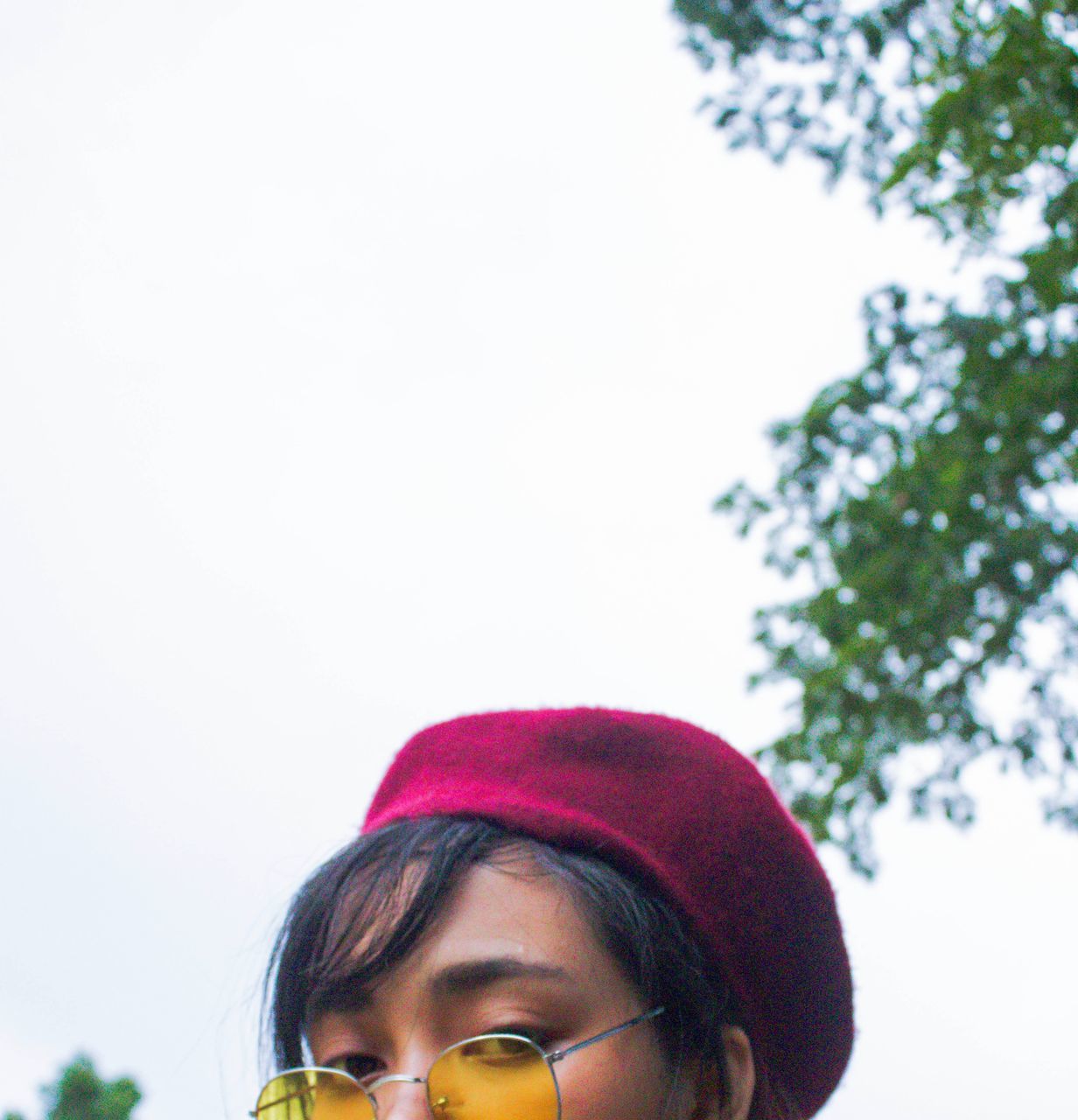 headshot, portrait, one person, real people, leisure activity, lifestyles, copy space, front view, day, sky, looking, hat, women, young adult, nature, close-up, human body part, females, young women, human face, outdoors, hairstyle, dyed hair