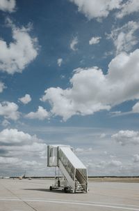 Lifeguard hut on road against sky