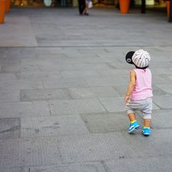 Boy standing outdoors
