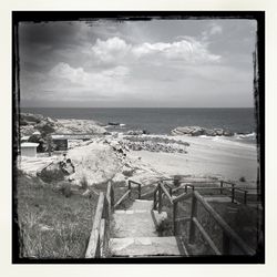 View of sea against cloudy sky