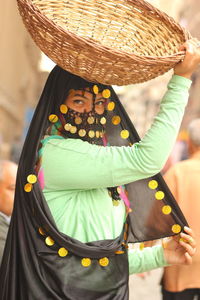 Close-up of man wearing hat