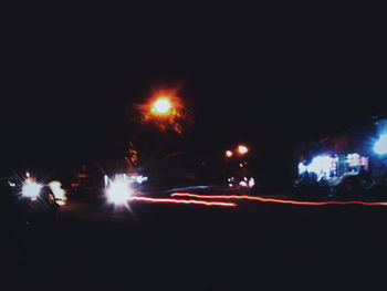 Illuminated street light at night