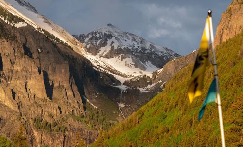 Panoramic view of snowcapped mountains against sky