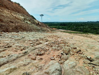 Surface level of road on land against sky